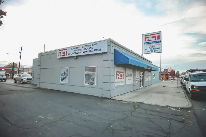 The ACT shop at 106 West Mead Avenue in Yakima, a grey building with a blue awning and the ACT pylon sign out front